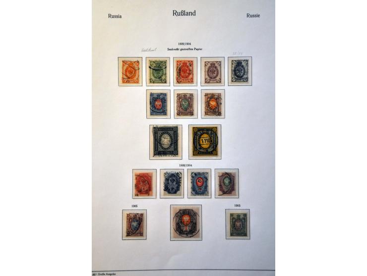 collection 1858-2008 with many better stamps and sets in 17 albums in 2 large boxes