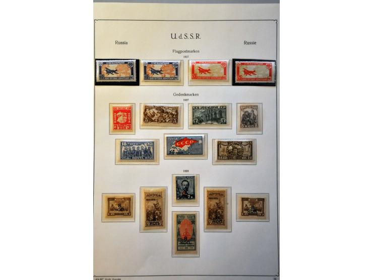 collection 1858-2008 with many better stamps and sets in 17 albums in 2 large boxes