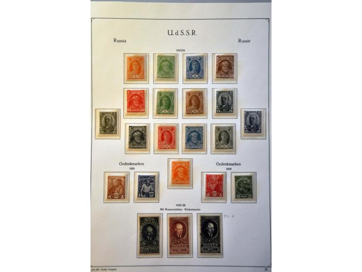 collection 1858-2008 with many better stamps and sets in 17 albums in 2 large boxes