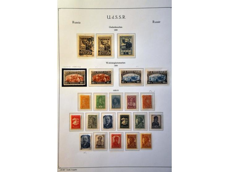 collection 1858-2008 with many better stamps and sets in 17 albums in 2 large boxes