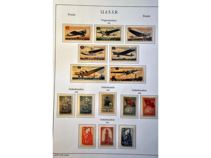 collection 1858-2008 with many better stamps and sets in 17 albums in 2 large boxes